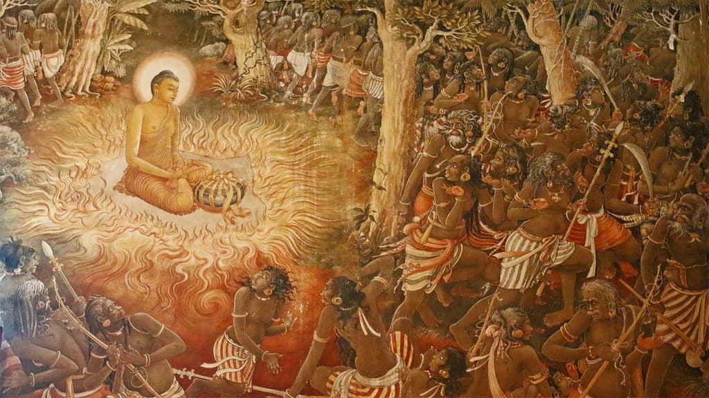 Ancient Buddha statue and golden architecture of Kelaniya Temple showing early Buddhist heritage