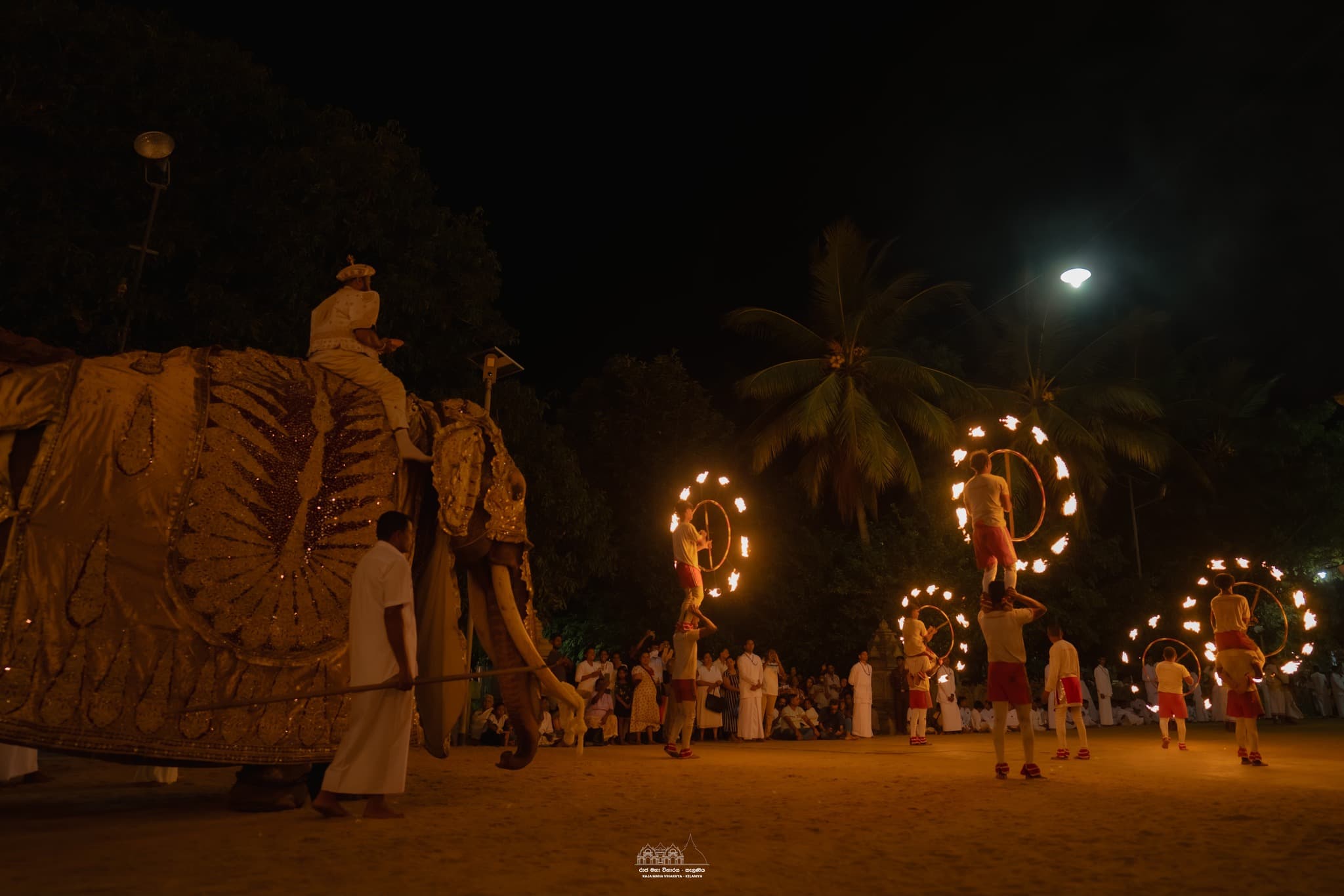 Whip crackers clearing the path for the procession